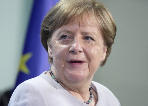 Kanselir Jerman Angela Merkel mendapat vaksin covid-19 AstraZeneca dan Moderna. Foto: AFP.