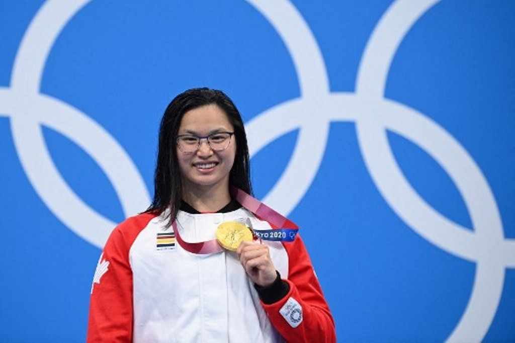 Canadian swimmer Margaret MacNeil wins Olympic gold in 100m butterfly