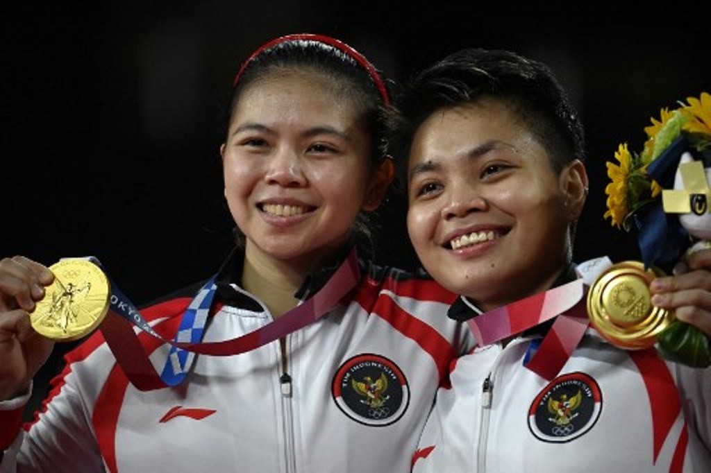Greysia Polii/Apriyani Rahayu menyumbangkan medali emas Olimpiade Tokyo 2020. (Foto AFP Alexander Nemenov)