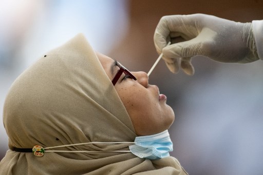 Di Tengah Krisis Politik, Malaysia Catat 15.764 Kasus Harian Covid-19