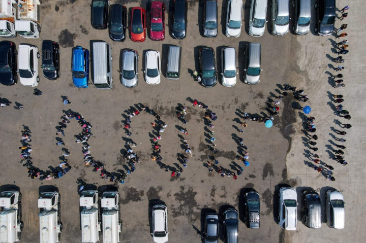 3 Foto Terpopuler: Antrean Mengular Vaksinasi Covid di Jakarta hingga Seungri Divonis 3 Tahun