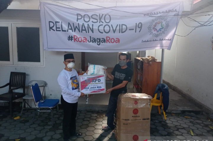 NasDem Palu Bantu APD Relawan Covid-19 dan Sebar Bantuan