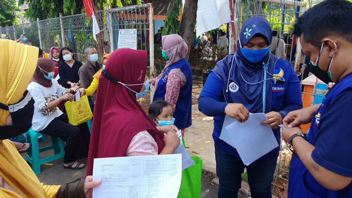 Kejar <i>Herd Immunity</i>, Nasdem Genjot Vaksinasi Massal Secara <i>Mobile</i>