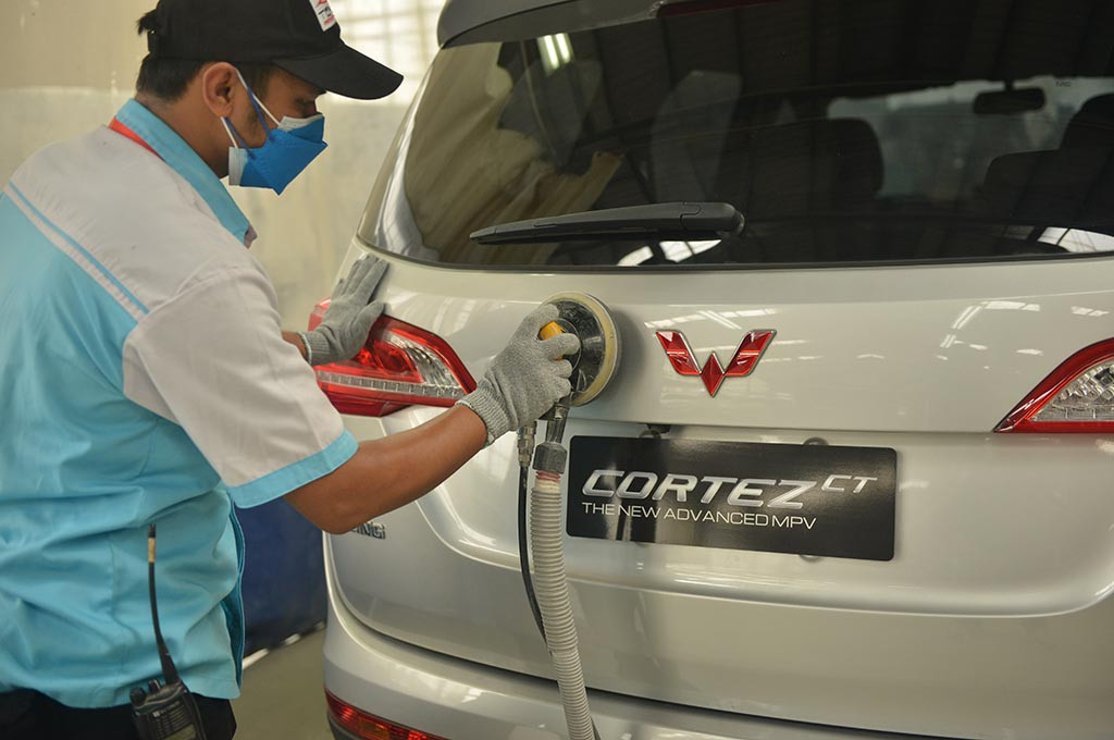 Ilustrasi pengerjaan cat mobil. Tekno Body Repair