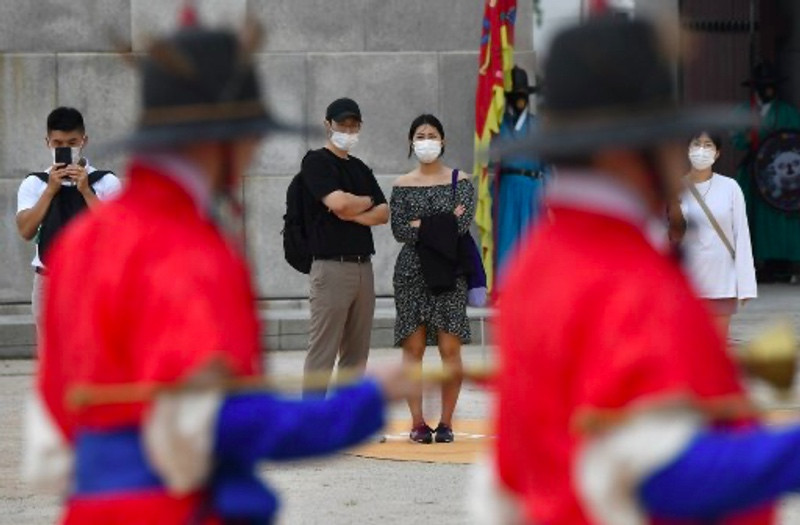 Korea Selatan akan memulai hidup berdampingan dengan covid-19 setelah Oktober 2021. Foto: AFP