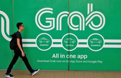 Grab Pangkas Proyeksi dalam Setahun
