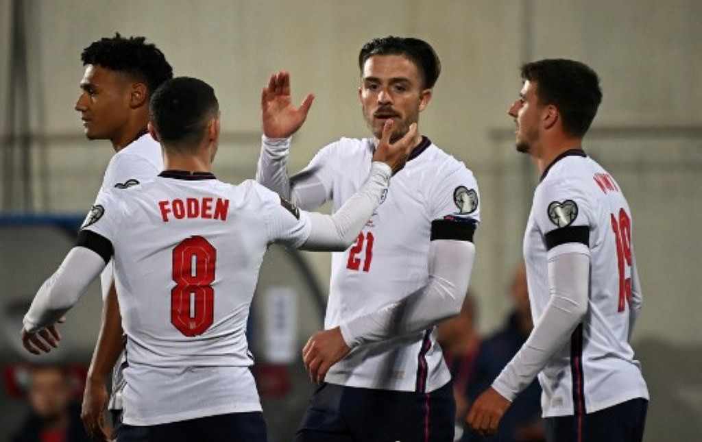 Jack Grealish berselebrasi usai membobol gawang Andorra (Foto: AFP/Lionel Bonavanture)