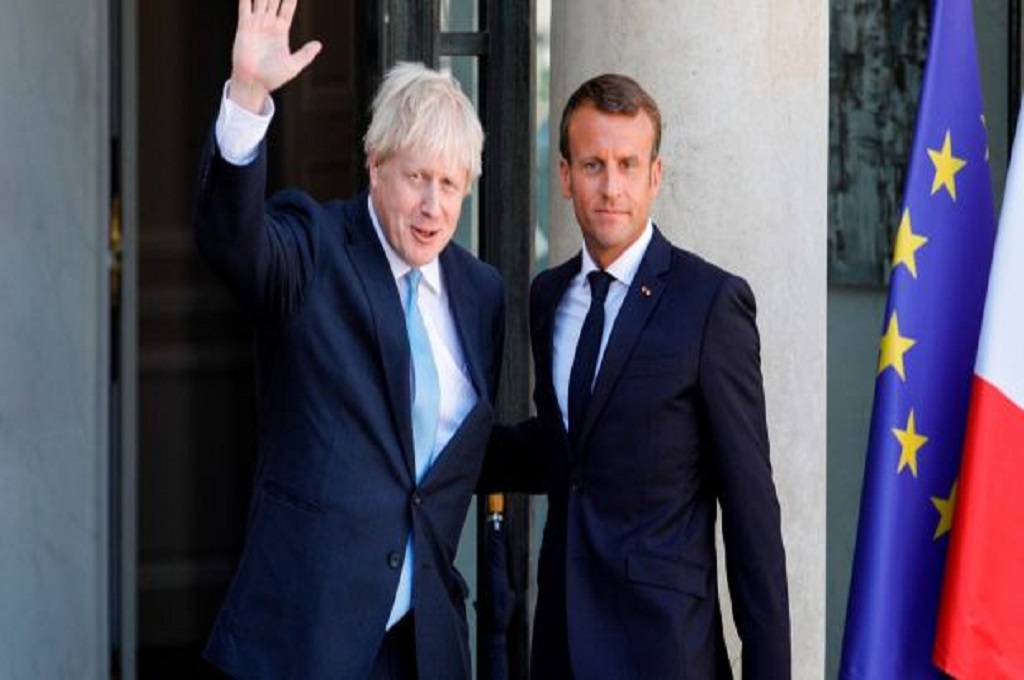 PM Inggris Boris Johnson (kiri) dan Presiden Prancis Emmanuel Macron. (Geoffroy van der Hasselt/AFP/Getty)