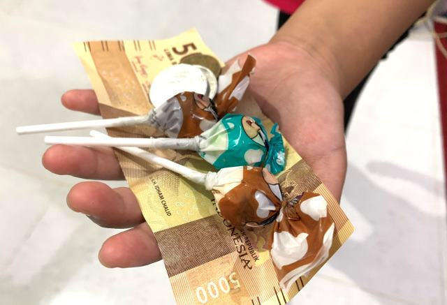 BI: QRIS Hilangkan Kembalian Transaksi dengan Permen