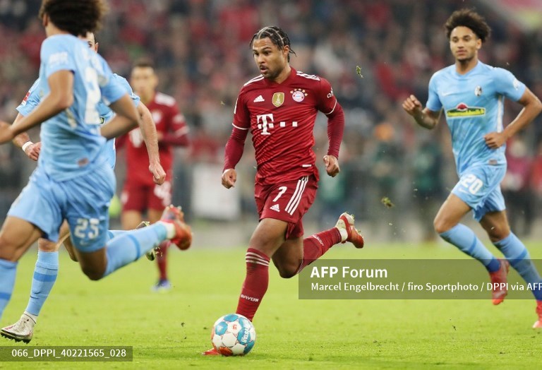 Suasana pertandingan Bayern Muenchen vs Freiburg (AFP/Marcel Engelbrecht)