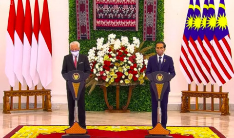 Kepada Jokowi, PM Malaysia Jamin Kesejahteraan dan Perlindungan TKI