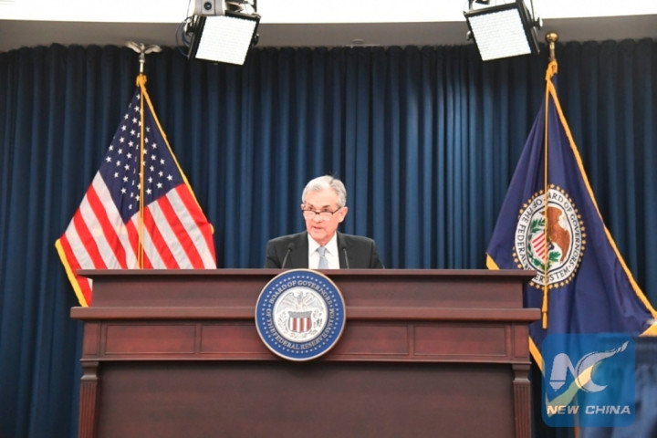 Fed Umumkan Percepat <i>Tapering</i> dan Bakal Naikkan Suku Bunga 3 Kali di 2022