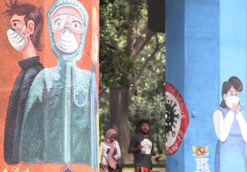 Ilustrasi--Mural edukasi dan sosialisai protokol kesehatan (Prokes) untuk pemberantasan penularan covid-19, di Jakarta Utara. (Foto: MI/ M Irfan)