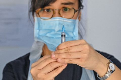 Populer Internasional: Sertifikat Vaksinasi Covid-19 di Malaysia hingga NATO Cegah Rusia