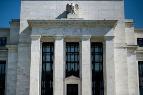 The Fed: Penyebaran Omicron Berpotensi Ganggu Aktivitas Bisnis di AS