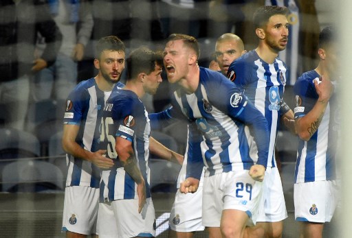 Selebrasi gol para pemain Porto. (MIGUEL RIOPA / AFP)