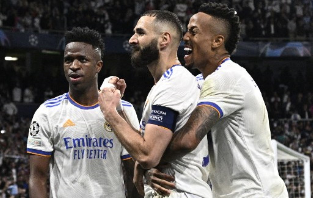 Selebrasi penyerang Real Madrid Karim Benzema (tengah) usai membobol gawang Manchester City (Foto: AFP/Javier Soriano)