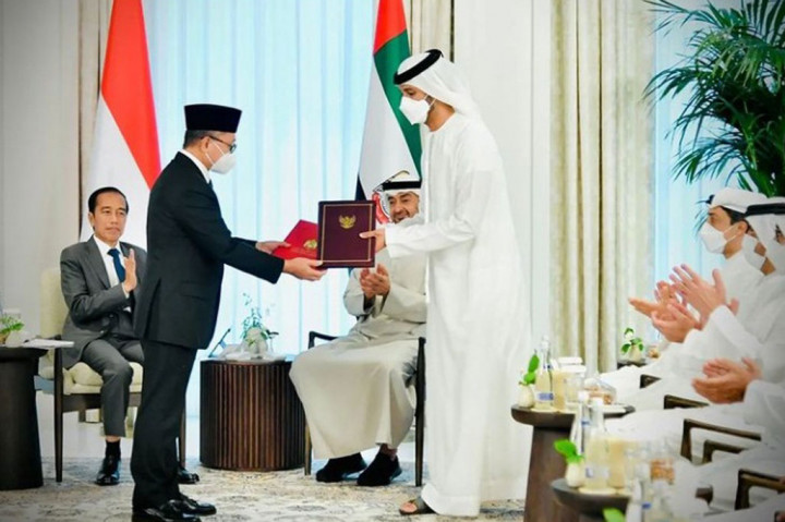 Momen Presiden Jokowi Saksikan Pertukaran Dokumen IUAE-CEPA