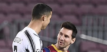 Cristiano Ronaldo (kiri) dan Lionel Messi (AFP/Josep Lago)