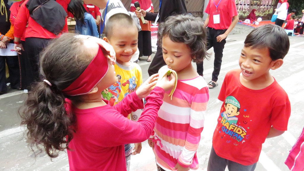 Melihat anak-anak bergembira menikmati perlombaan 17 Agustusan yang selama dua tahun ke belakang tak dilaksanakan. (Foto: A. Firdaus/Medcom.id)