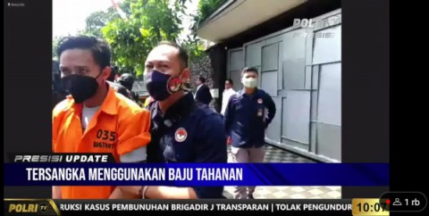 Bharada E pakai baju tahanan didampingi LPSK mengikuti rekonstruksi pembunuhan Brigadir J. Medcom.id/Fachri.