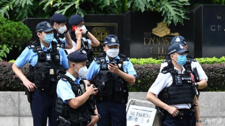 Hong Kong Tangkap Pemain Harmonika atas Penghasutan di Pemakaman Ratu