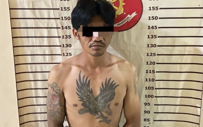 Pemuda pelaku perbuatan tidak senonoh kepada sejumlah siswi SMAN 3 Kotabumi. Dok./Polres Lampura