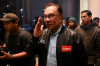 Anwar in Talks with Najib Despite Anti-Graft Pledge