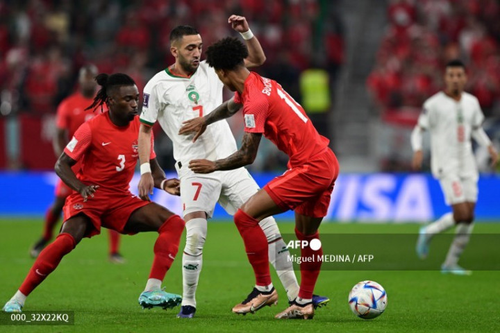 Bekuk Kanada, Maroko Juara Grup