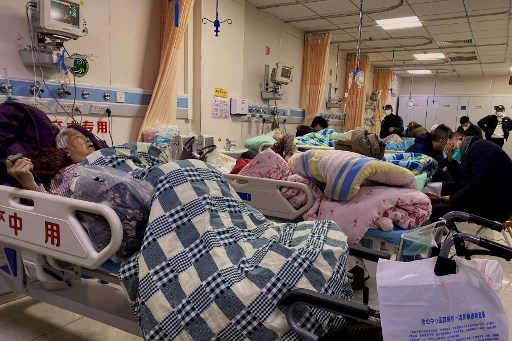 Pasien covid-19 yang dirawat di Tiongkok. Foto: AFP