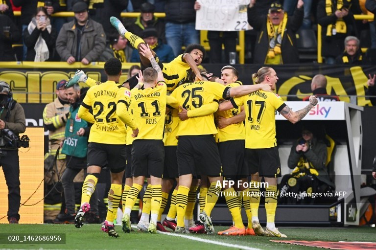 Pemain Borussia Dortmund merayakan kemenangan atas Freiburg (AFP/Stuart Franklin)