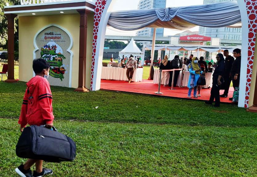 Seorang Anak sedang menuju acara pelepasan Mudik Gratis Matahari. Foto: A. Firdaus/Medcom