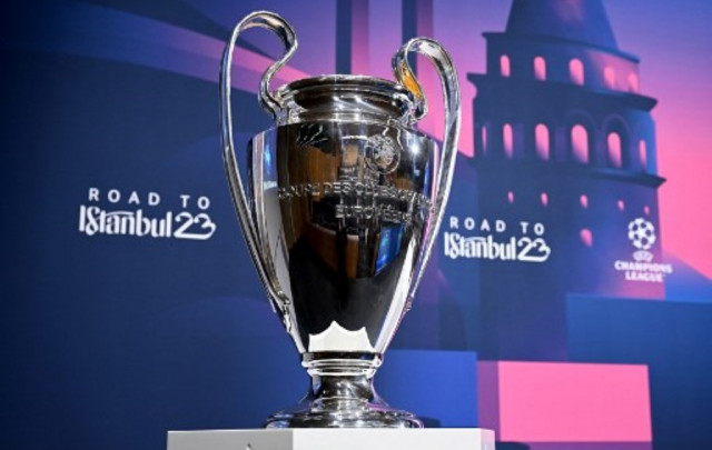 Trofi Liga Champions. (Foto: AFP/Fabrice Coffrini)