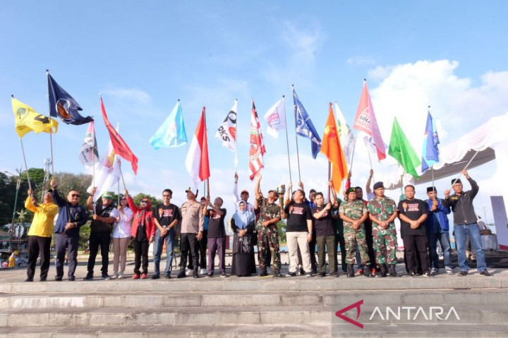 Bawaslu Tanjungpinang Sosialisasikan Pengawasan Partisipatif Lewat Parade Obor