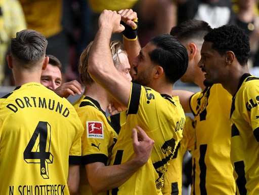 Selebrasi gol para penggawa Borussia Dortmund. (CHRISTOF STACHE / AFP)