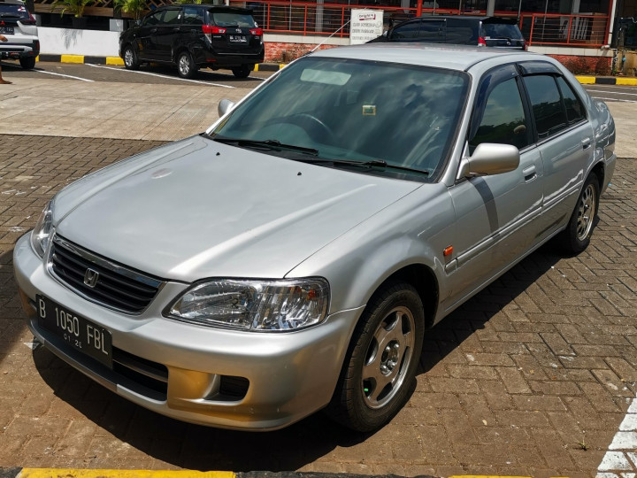 Kaca Film Pekat Bukan Jaminan Adem