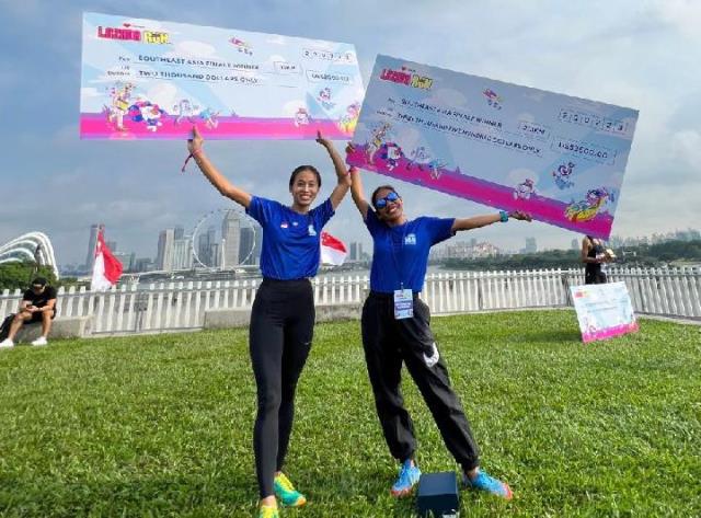 Dua pelari Indonesia, Odekta Elvina Naibaho dan Novia Nur Nirwani mencatatkan kemenangan tersebut di event final Lazada Run. (Foto: Dok. Lazada)