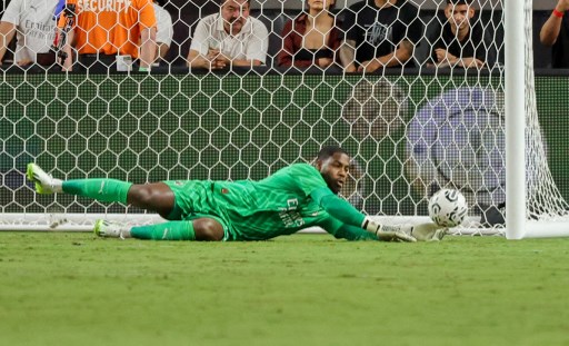 Kiper AC Milan Mike Maignan. (Ethan Miller / GETTY IMAGES NORTH AMERICA / Getty Images via AFP)