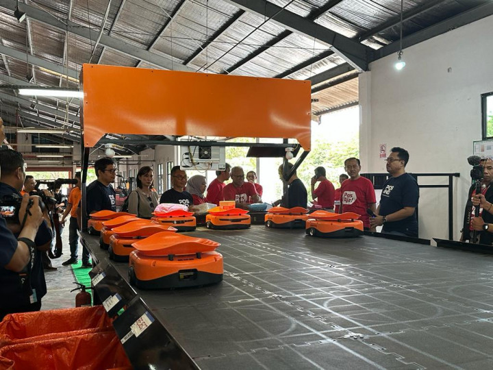 Transformasi Baru Pos Indonesia, Terapkan Teknologi Robotik dan RFID