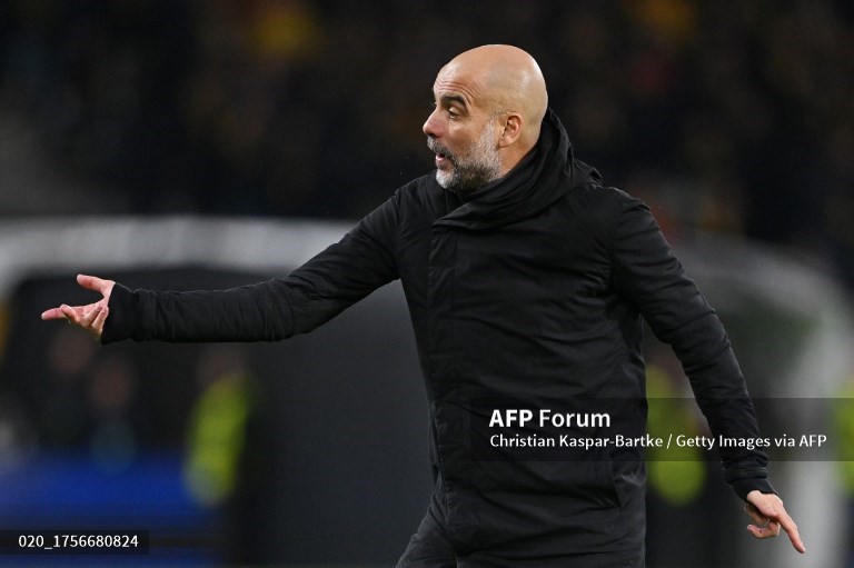 Pelatih Manchester City, Pep Guardiola (AFP/Christian Kaspar-Bartke)