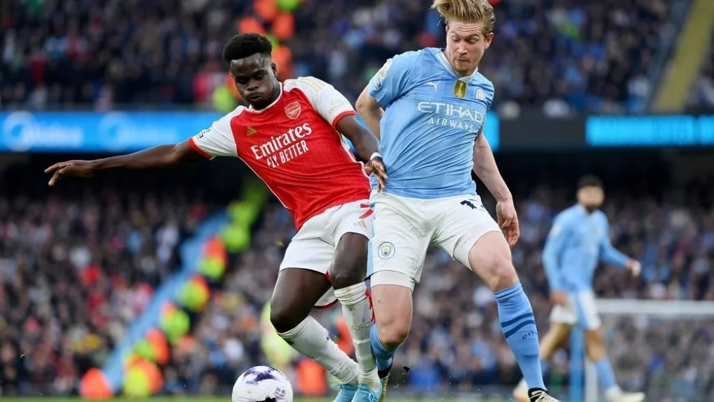 Arsenal dan Manchester City berebut gelar juara hingga pekan terakhir. (dok arsenal.com)