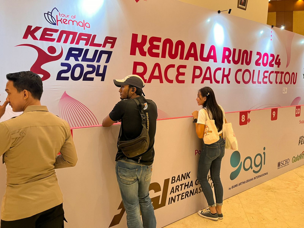 Tempat ambil racepack di Auditorium Mutiara PTIK. Foto Istimewa.