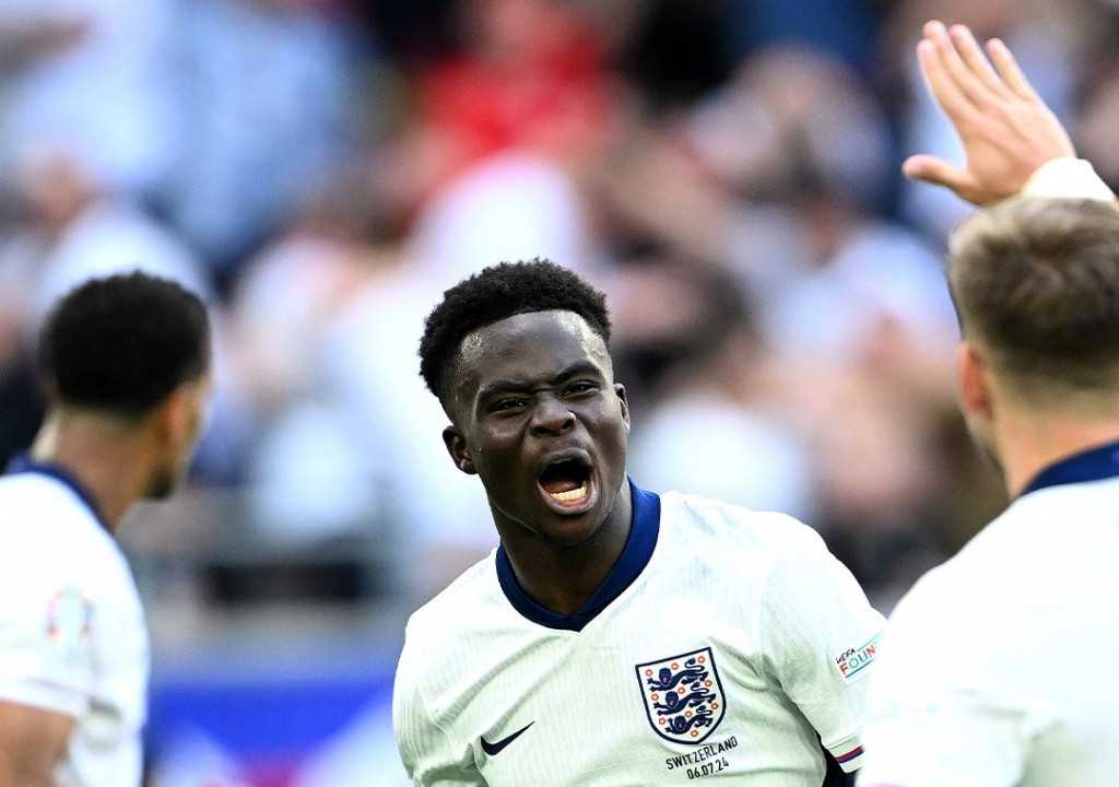 Winger Inggris, Bukayo Saka, merayakan gol ke gawang Swiss (X: @EURO2024)
