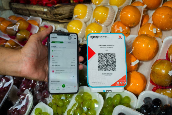 Cara Mudah Cairkan Uang Cegah Transaksi Palsu bagi UMKM di GoPay