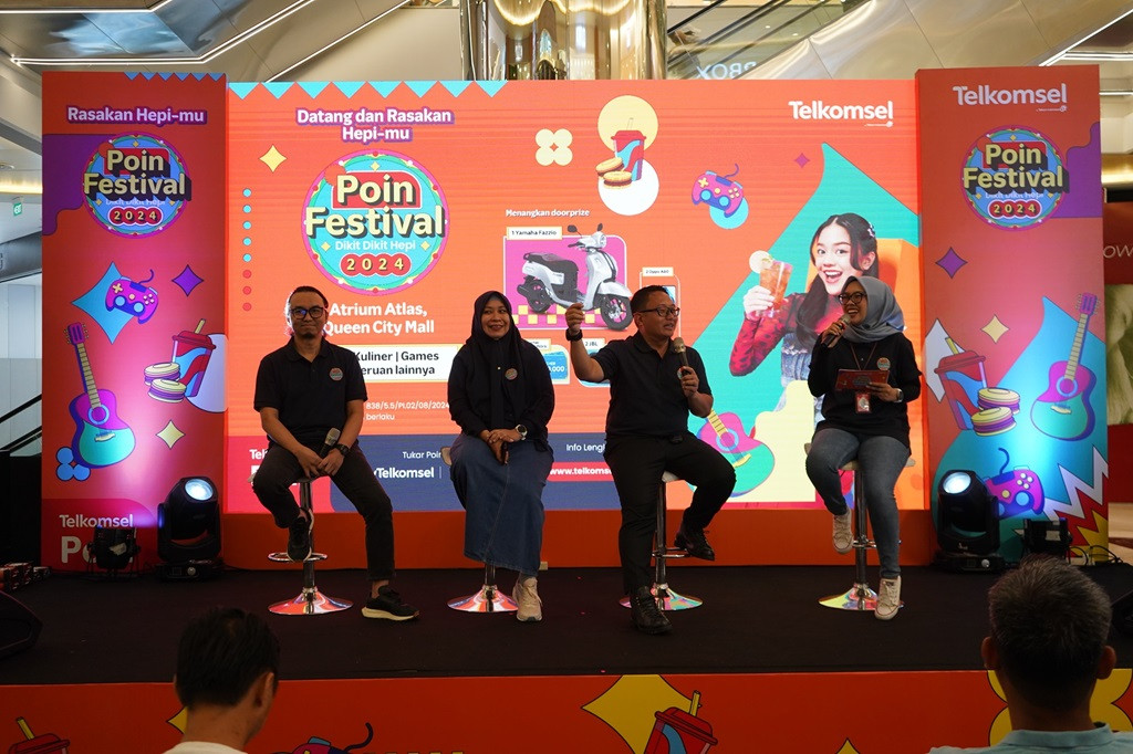 Pengumuman rangkaian Poin Festival Roadshow oleh Telkomsel.