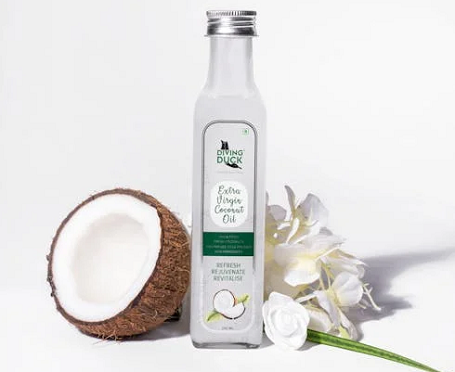 5 Cara Pakai Minyak Kelapa untuk Perawatan Rambut