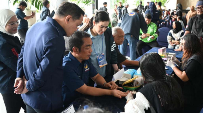 Pemeriksaan kesehatan gratis yang digelar Nasdem berjalan antusias dari khalayak. Dok. Ist