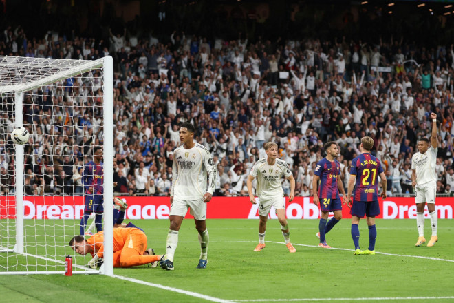 Ekspresi gelandang Real Madrid, Jude Bellingham, setelah membobol gawang Barcelona (AFP/Oscar Del Pozo)