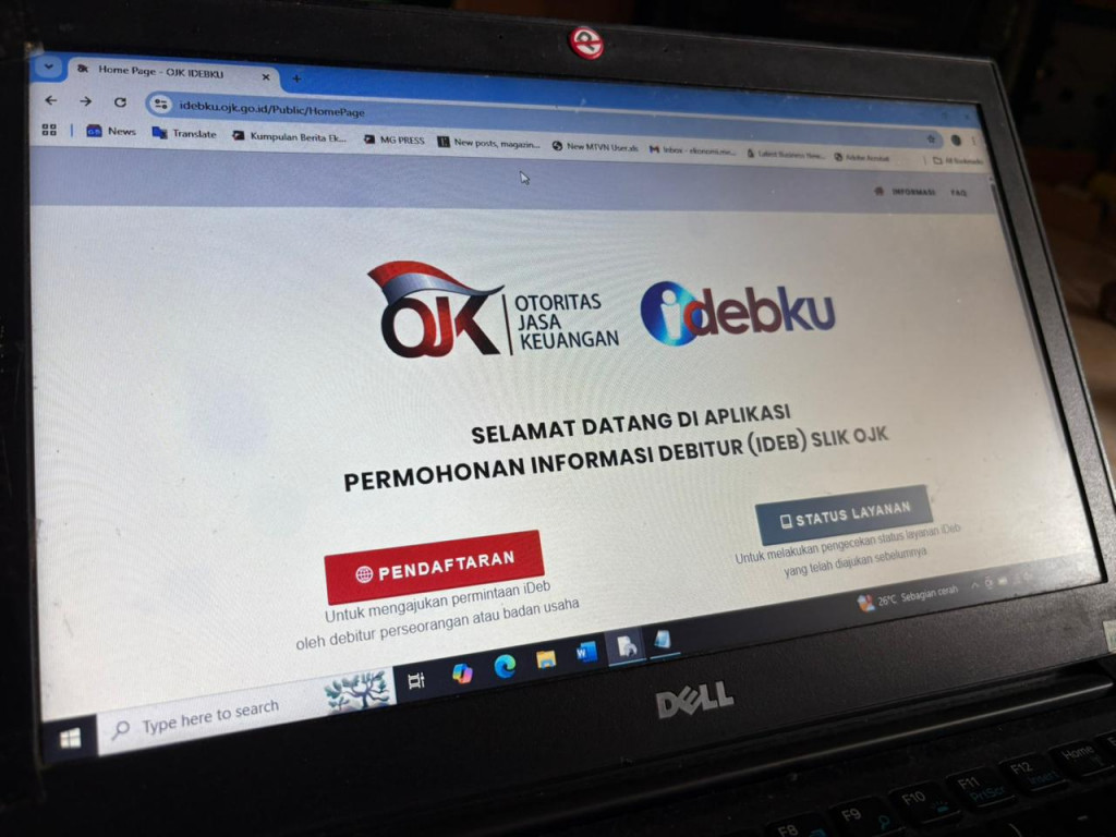 Ilustrasi mengecek sko kredit di iDeb OJK. Foto: Medcom.id/Annisa ayu