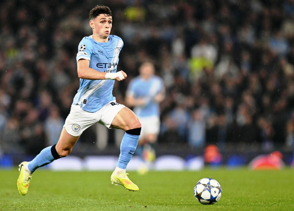 Phil Foden sumbang dua gol saat City libas Dortmund 4-1-Foto OLI SCARFF / AFP